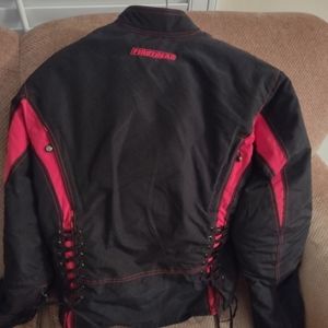 Ladies Firstgear motorcycle jacket and matching Teknic gloves.